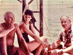 A friend of mine took this photo 1985 The week Mel Fisher discovered 0 million worth of treasure off the shores of Key West that’s Lisa Johnny Carson and Mel hell of a photographJohnny just did his first dive over the treasure